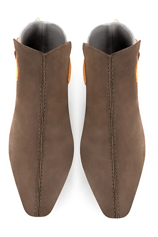 Chocolate brown, gold and apricot orange women's ankle boots with buckles at the back. Square toe. Flat flare heels. Top view - Florence KOOIJMAN